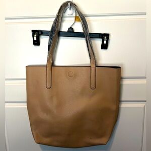 Reversible faux leather tote bag